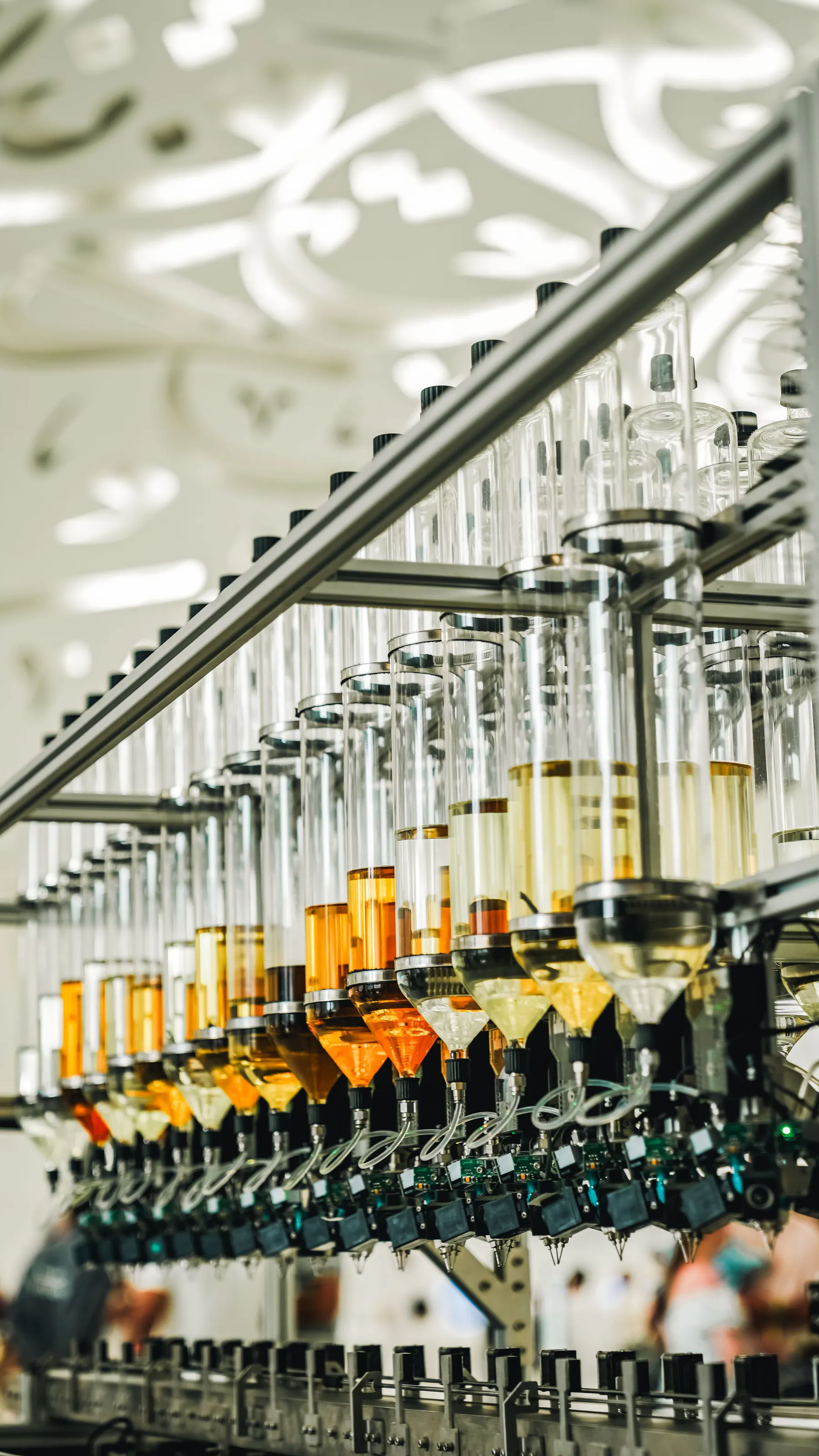 Automated liquid filling array with multiple glass containers